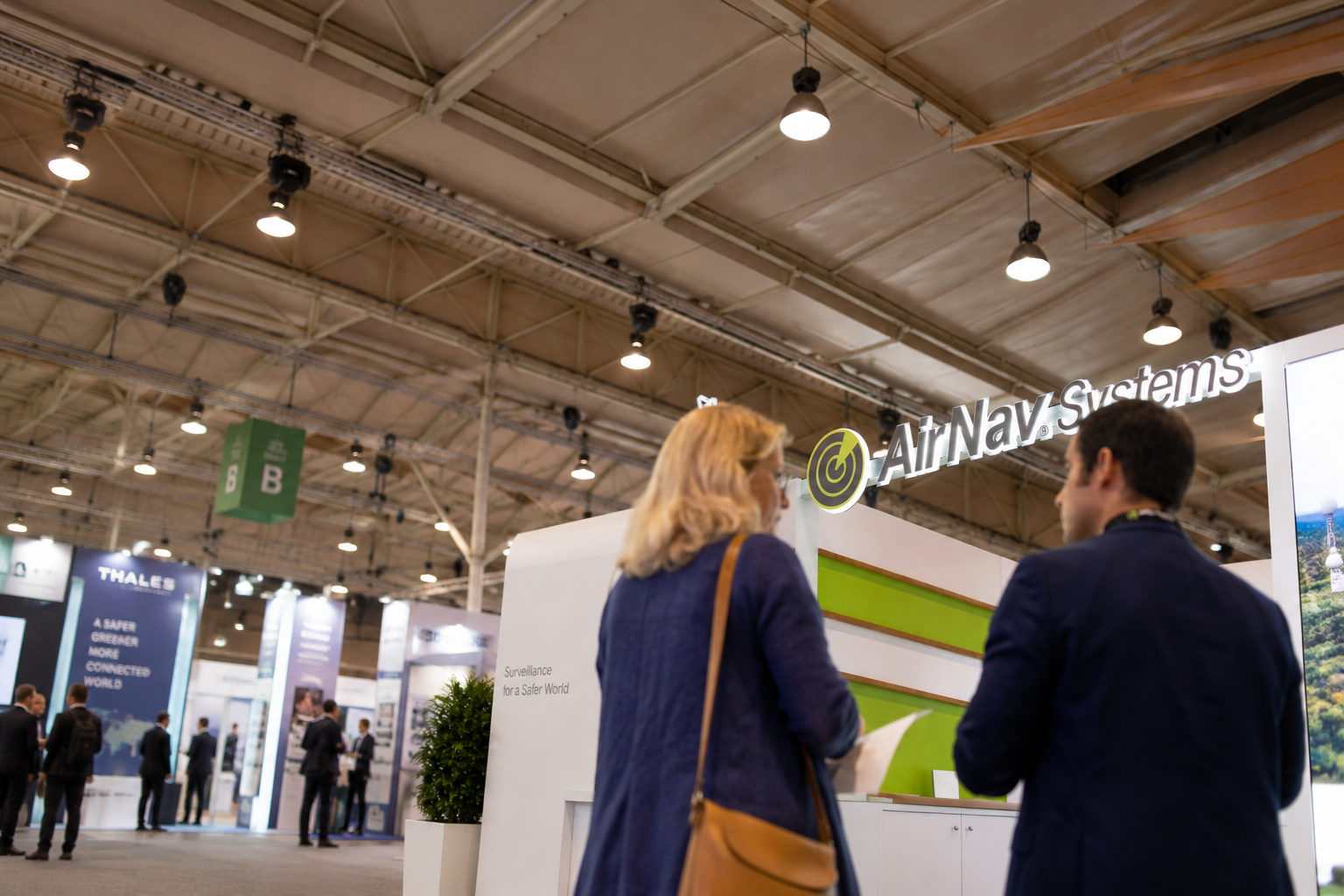 AirNav Systems exhibition booth with visitors
