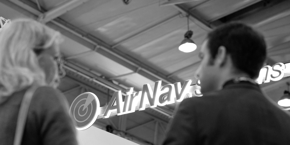 AirNav Systems representatives at an aviation industry event.