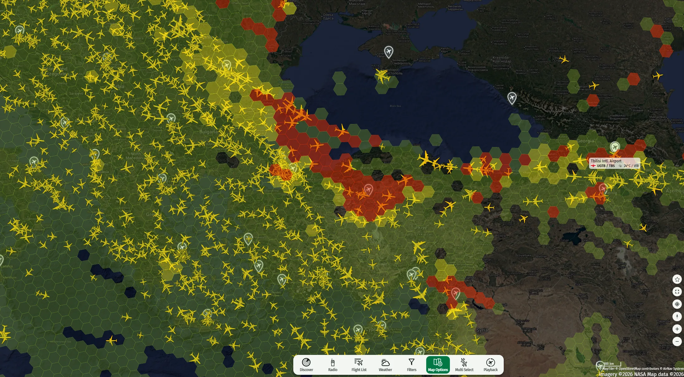 GPS Spoofing Viewer showing aircraft traffic and GPS accuracy hexagons.